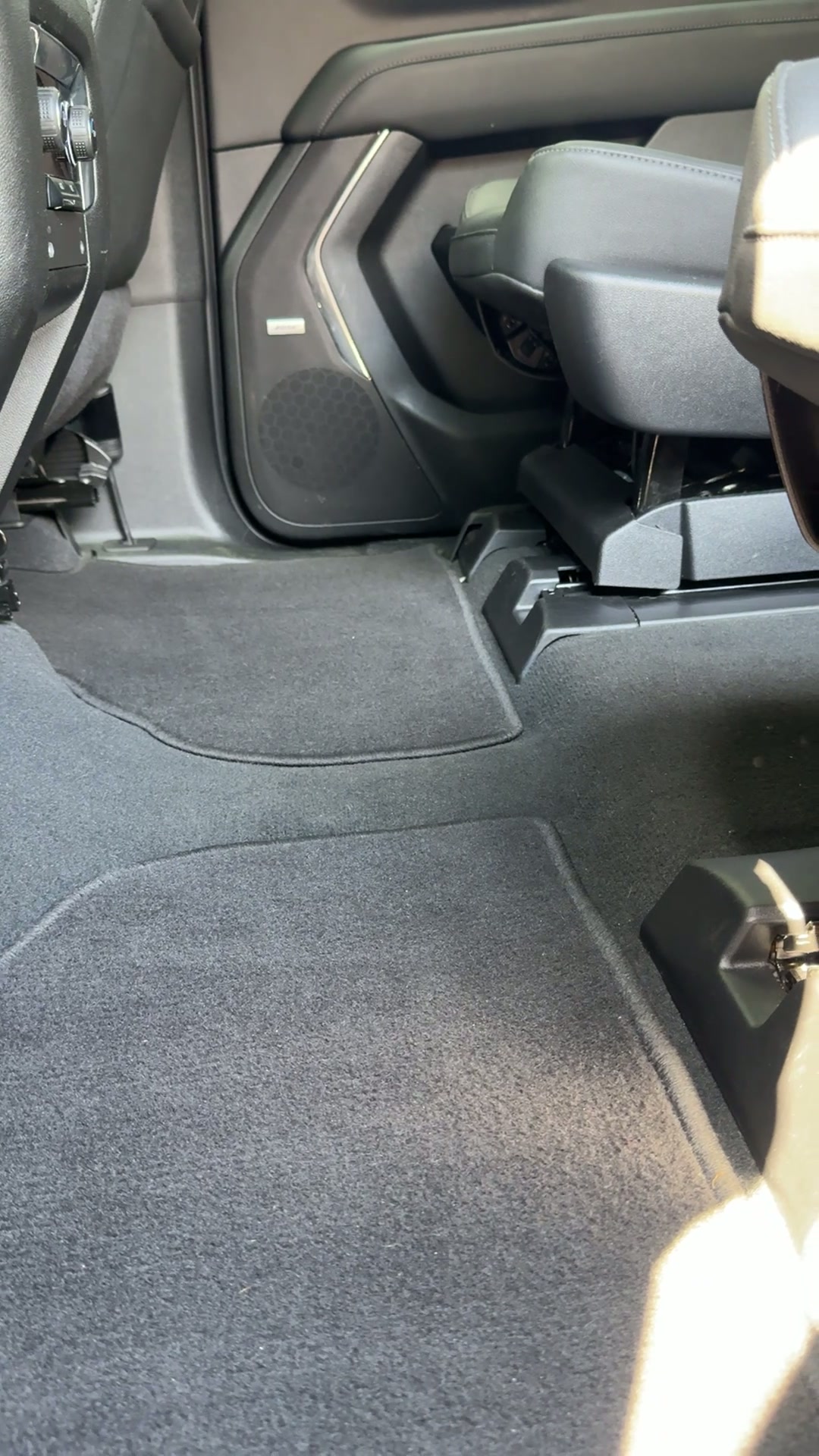 Rear seat floor crumb and debris removal — after